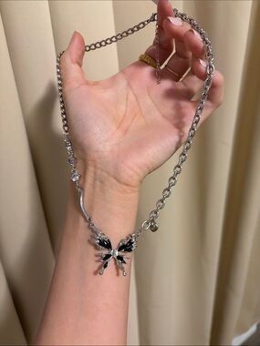 Silver Butterfly Pendant Necklace with Black Enamel Accent